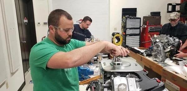 Powerhouse Generator -a man working on a machine