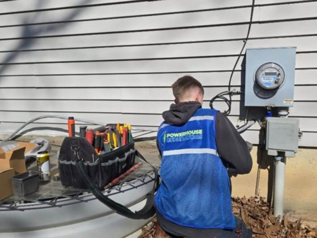 Technician installing a standby generator to provide whole-house generator protection during severe weather outages.